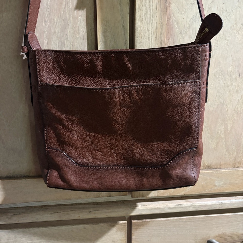 FRYE genuine leather brown crossbody. 2 pockets inside & zipper.